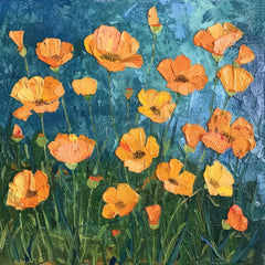 Orange flowers in the grass
