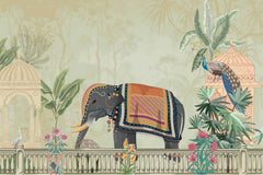 Decorated elephant and peacock on a balcony with intricate patterns and colors, surrounded by lush greenery and ornate architecture.