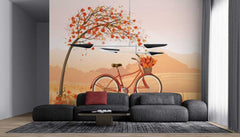 A beautiful autumn-themed wallpaper featuring a bicycle, tree, and rolling hills, adding a touch of warmth and coziness to a modern living room.