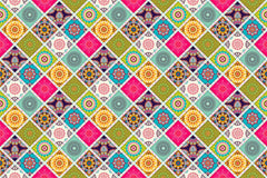 Traditional Indian mandala artwork in vivid tones used as wall art wallpaper.