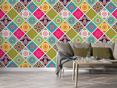 Traditional Indian mandala artwork in vivid tones used as wall art wallpaper.