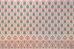 Decorative jaal print wallpaper with celestial detailing and classic Indian patterns.